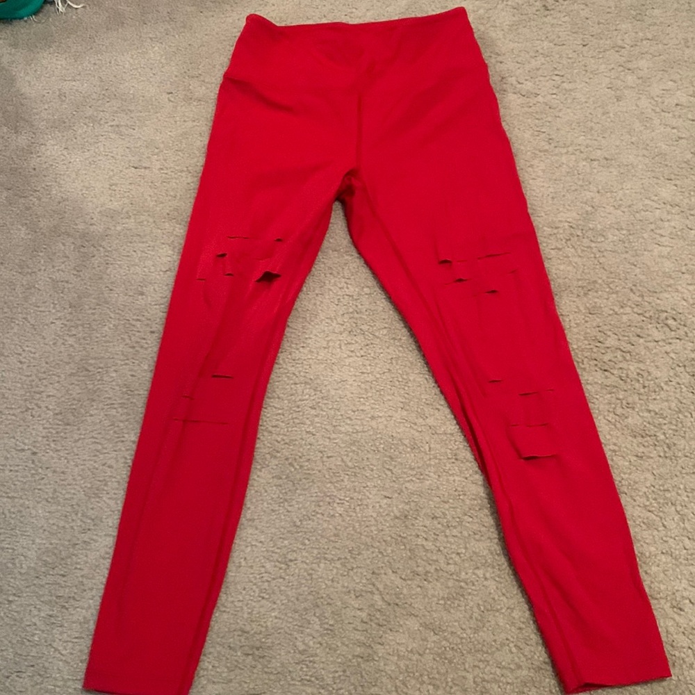 Red slash leggings